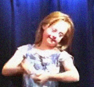 Down syndrome girl signing ASL
